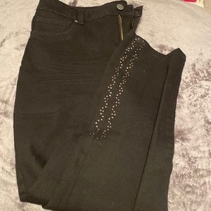 Black capri jeans with small beads near the ankles